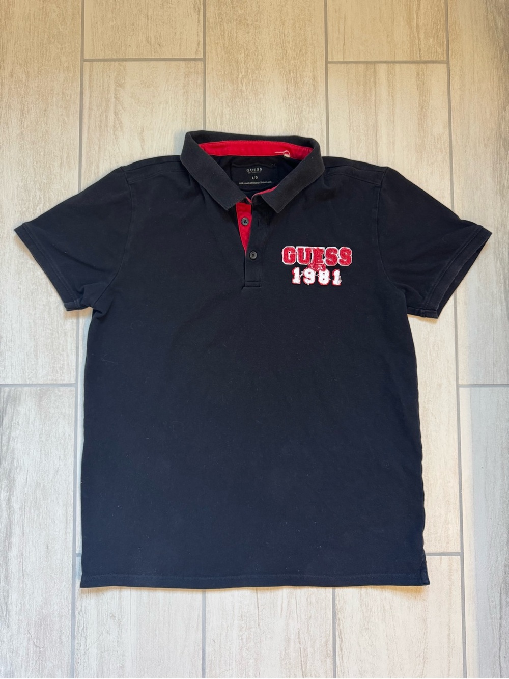 GUESS Men's Black Polo Shirt with Red Accent - 1981 Logo